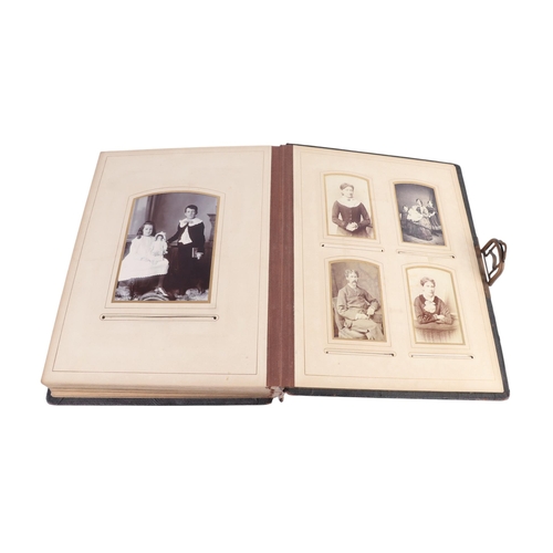 30 - A Victorian photo album containing family photos and carte de visite.