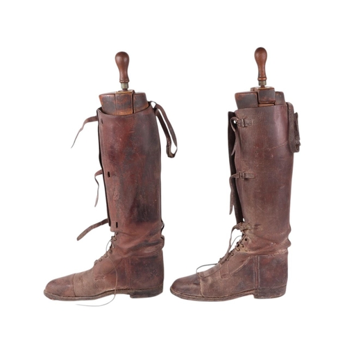 32 - A pair of WWI Officer's leather riding boots, both with wooden trees by Peal & Co, London, overall 5... 