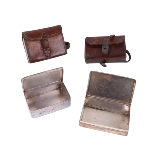 33 - Two WWI Officer's leather pouches containing silver plated tins; together with a leather frog (3).