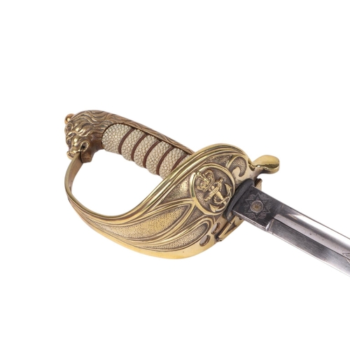 34 - A Royal Marine naval dress sword with shagreen brass hilt and lion head terminal, 95cms long.