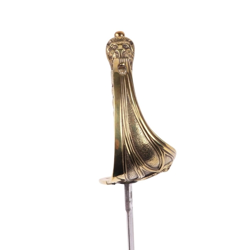 34 - A Royal Marine naval dress sword with shagreen brass hilt and lion head terminal, 95cms long.