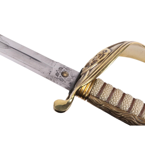 34 - A Royal Marine naval dress sword with shagreen brass hilt and lion head terminal, 95cms long.