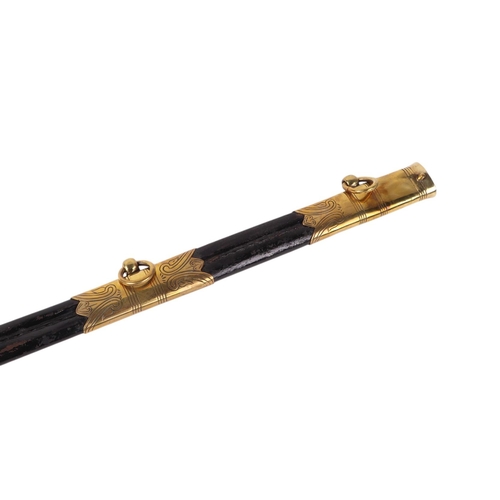 34 - A Royal Marine naval dress sword with shagreen brass hilt and lion head terminal, 95cms long.