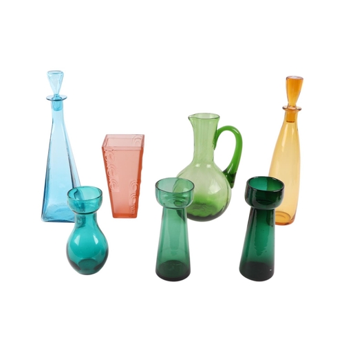 385 - A quantity of coloured glass to include Hyacinth vases, decanters and jugs.