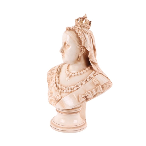 404 - A Victorian glazed pottery bust depicting Queen Victoria with date lozenge to the underside, 23cms h... 