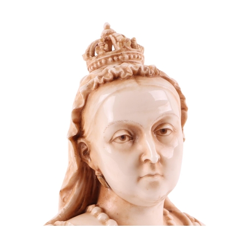 404 - A Victorian glazed pottery bust depicting Queen Victoria with date lozenge to the underside, 23cms h... 