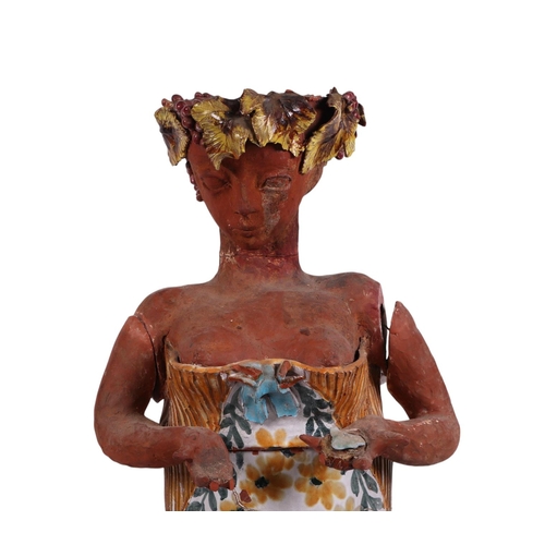 411 - A large mid-20th century Studio Pottery figure of a woman, fired in four sections by Eugene Carter, ... 