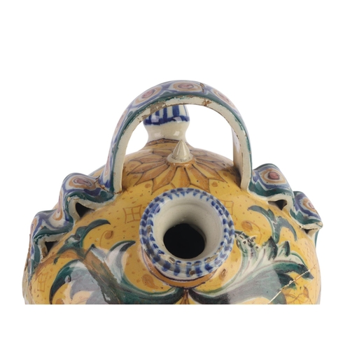 416 - A continental faience wine or water carrier; together with an arbarello of waisted form, decorated w... 