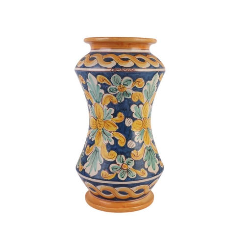 416 - A continental faience wine or water carrier; together with an arbarello of waisted form, decorated w... 