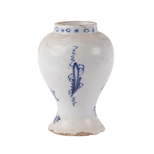 441 - An 18th century blue & white Delft vase decorated in the chinoiserie style with buildings in a lands... 