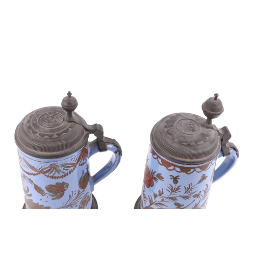 445 - An early 19th century German faience stein with hinged pewter lid with engraved date 1813, decorated... 