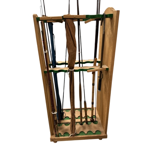 456 - Hunting, Shooting and Fishing Interest:  A pine free-standing shop display fishing rod stand for twe... 