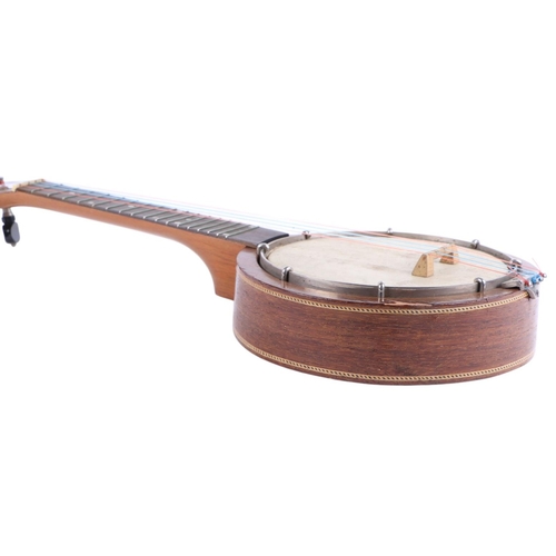 481 - A Keech banjolele, model no. C5152, cased, 56cms long.