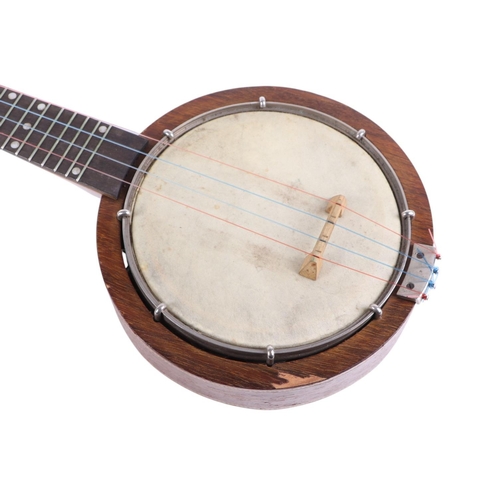 481 - A Keech banjolele, model no. C5152, cased, 56cms long.