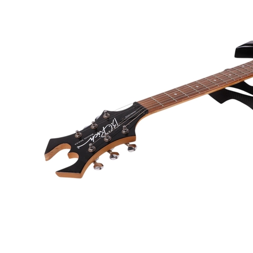 483 - A B C Rich bronze series Warlock six-string electric guitar in a soft carry case, 112cms long.