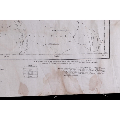 49 - A group of WWII and pre-WWII maps printed on textile, compiled and Zincographed at the survey Office... 