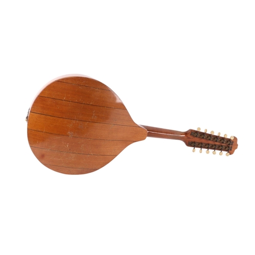 491 - A Dreima continental 12-string mandolin with inlaid decoration, cased, 67cms long.