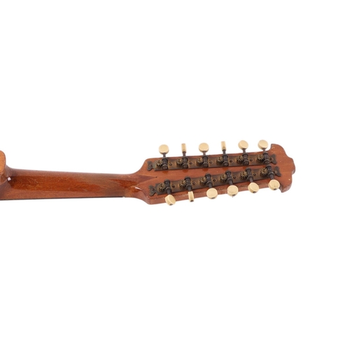 491 - A Dreima continental 12-string mandolin with inlaid decoration, cased, 67cms long.