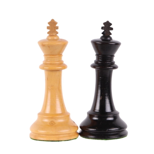 510 - A boxwood and ebonised chess set in a mahogany box, king height 6.5cms high; together with a boxed g... 