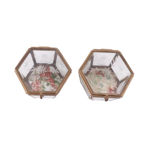 514 - A pair of gilt metal and etched glass hexagonal form trinket boxes, 14cms wide (2).