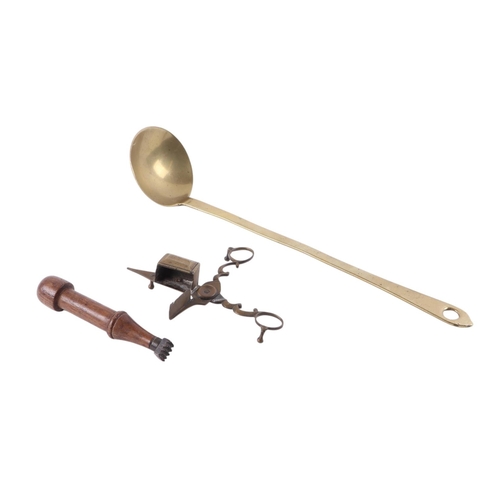 529 - A George III brass ladle; together with a pair of brass scissor snuffers and a treen handled desk se... 