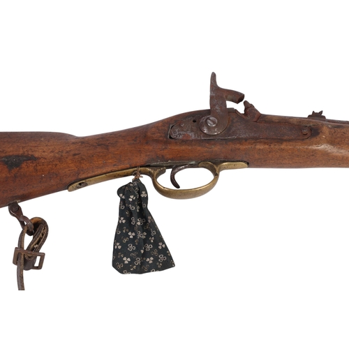 54 - A 19th century percussion cap rifle with brass finger guard, 92cms long.