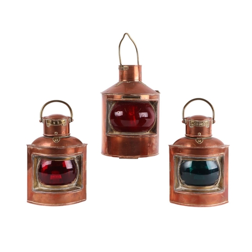 598 - Three copper and brass port and starboard lamps, approx 22xms high each (3).