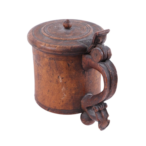 605 - A 19th century Norwegian burr wood lidded stein, 20cms high.Condition ReportIt is missing one of the... 