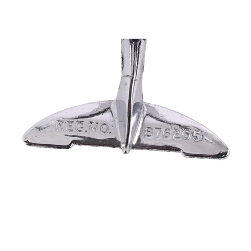 615 - An Art Deco novelty cruet set in the form of a chrome plated aeroplane with the pepper and pepperett... 