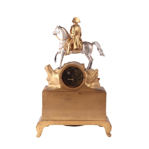 621 - A 19th century gilt metal French mantle clock surmounted a figure of Napoleon on horseback, the whit... 