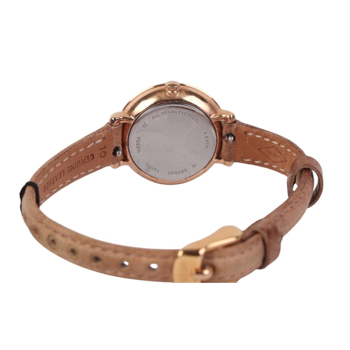 636 - A ladies boxed Fossil watch with leather strap.