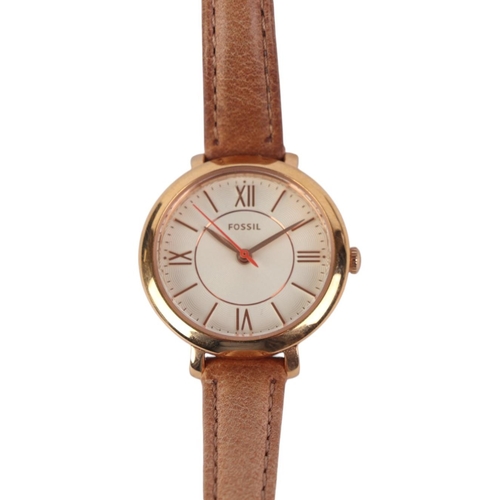 636 - A ladies boxed Fossil watch with leather strap.