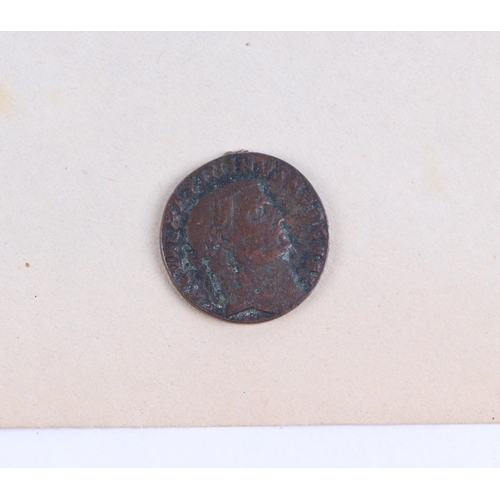 654 - A quantity of mixed coinage and stamps