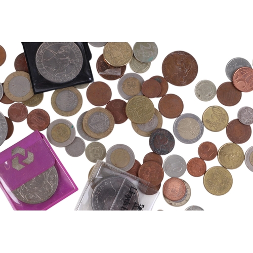 654 - A quantity of mixed coinage and stamps