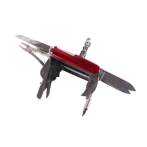 67 - A Victorinox Swiss Army knife, approximately 30 tools to include a lighter , hex keys, scissors, scr... 