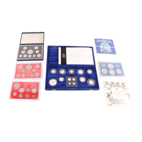 690 - An Elizabeth II Royal Mint Millennium collection silver proof thirteen coin set; together with silve... 