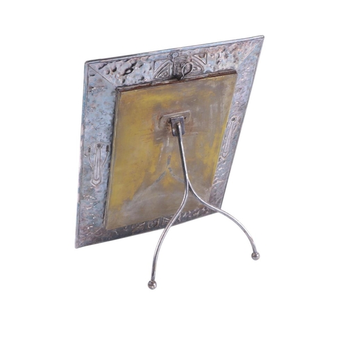 726 - An Art Nouveau silver plated strut table mirror, overall 30 by 41cms.Condition ReportGood overall co... 