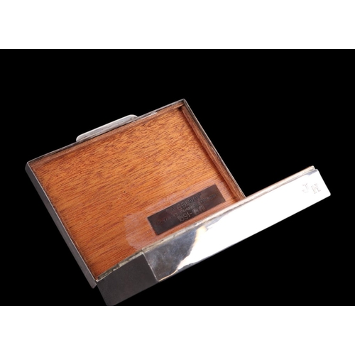 733 - A 925 silver table top cigarette box, 13cms wide, gross 258g, a Sterling silver napkin ring together... 