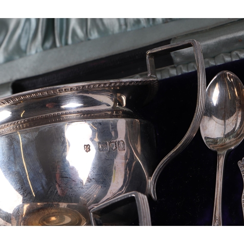 745 - An Elkington Victorian silver milk jug, sugar bowl and matching teaspoons and sugar tongs, London 18... 