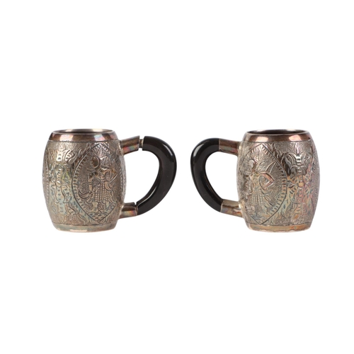 746 - Two miniature Thai silver tankards, 39g, 4cms high (2).