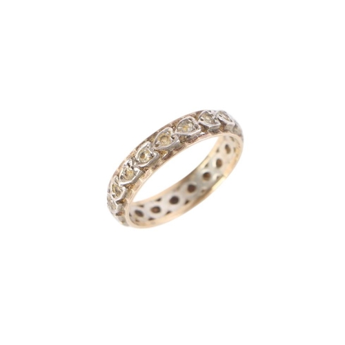 767 - A 9ct gold and silver eternity ring set with white stones, approx UK size R, 2.8g.