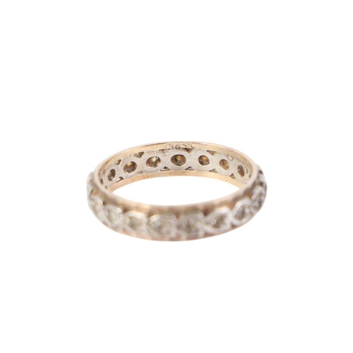 767 - A 9ct gold and silver eternity ring set with white stones, approx UK size R, 2.8g.