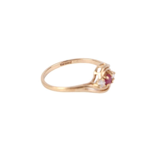 771 - A 9ct gold ruby and white stone ring, approx UK size N, 1.4g.