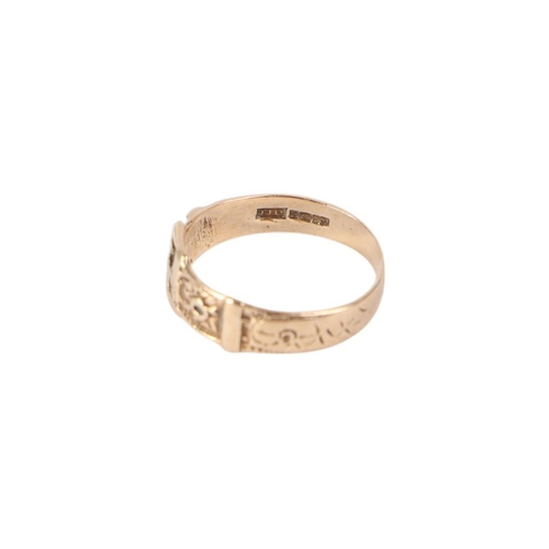 775 - A 9ct gold buckle ring, approx UK size M, 1.8g.