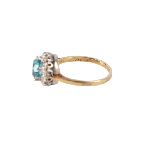 782 - An 18ct gold aquamarine and diamond cluster ring, approx UK size L, 3.5g.