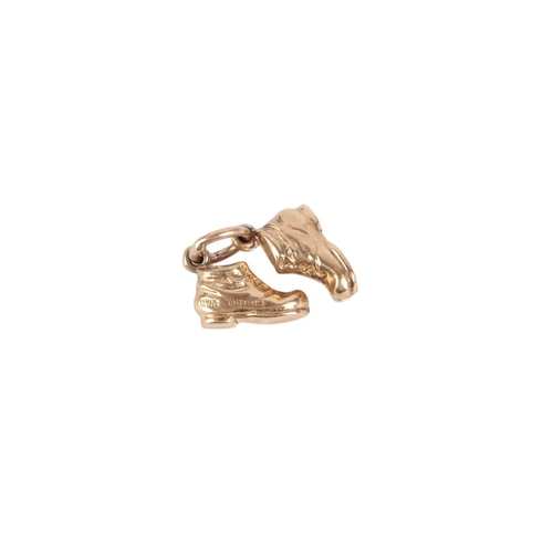 785 - Four 9ct gold charms, 2.5g; together with four yellow coloured metal charms (8).