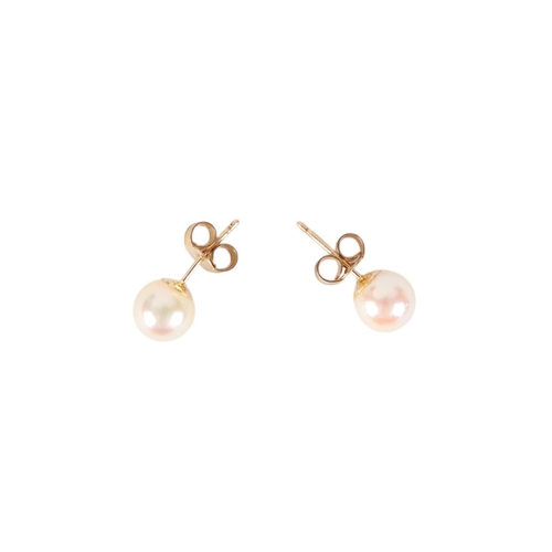 789 - A pair of 9ct gold mounted pearl stud earrings.