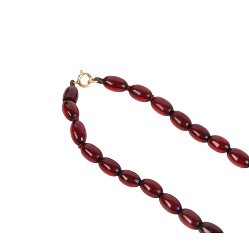 798 - A cherry amber Bakelite style graduated bead necklace,43g, 61cms long.