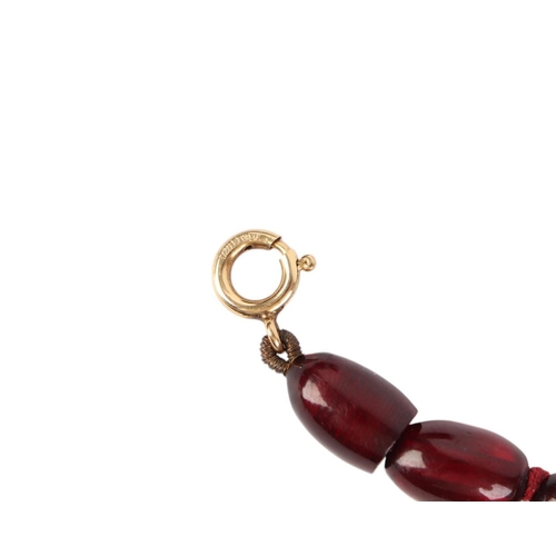 798 - A cherry amber Bakelite style graduated bead necklace,43g, 61cms long.