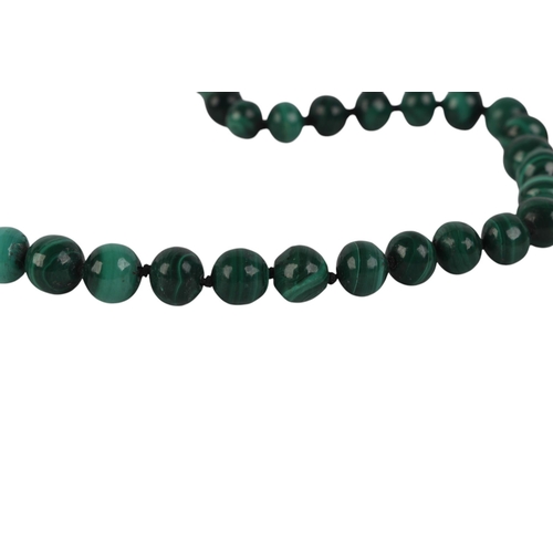 799 - A group of bead necklaces to include malachite and carnelian.